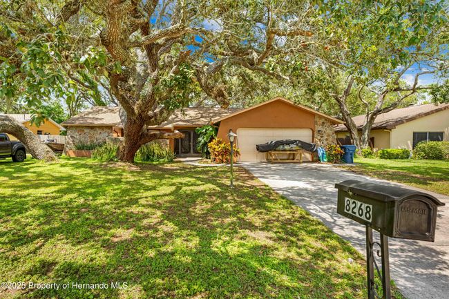 8268 Garrison St, House other with 3 bedrooms, 3 bathrooms and null parking in Spring Hill FL | Image 6