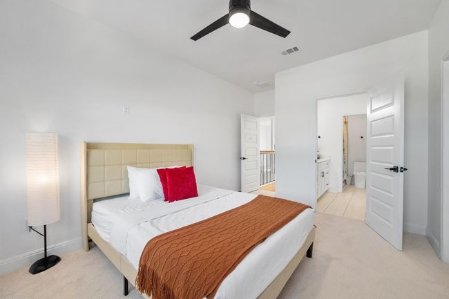 The secondary bedrooms are thoughtfully designed with a Jack-and-Jill bathroom, offering convenience, privacy, and stylish functionality. | Image 28