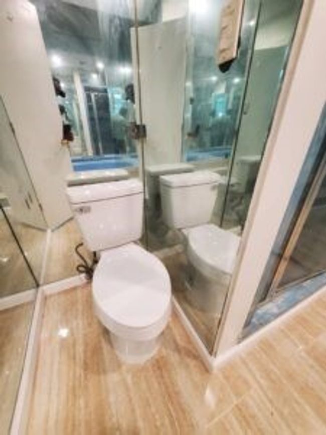 Bathroom with wood finished floors and a stall shower | Image 36