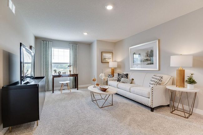 Great loft space that can be used as a game room or 2nd entertainment space. Previously built model home, finishes, selections, and colors to vary from future built home. | Image 19