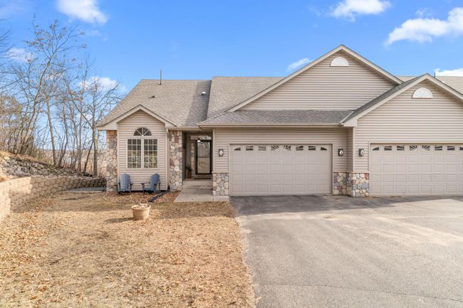 For Sale is the end unit townhome - 8087 Pine Point. This unit comes with a newly constructed 30x40 heated and insulated garage with living space above. | Image 4