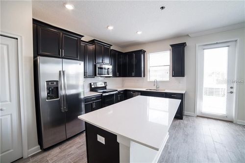 1225 Payne Stewart Dr, DAVENPORT, FL, 33896-5498 | Card Image