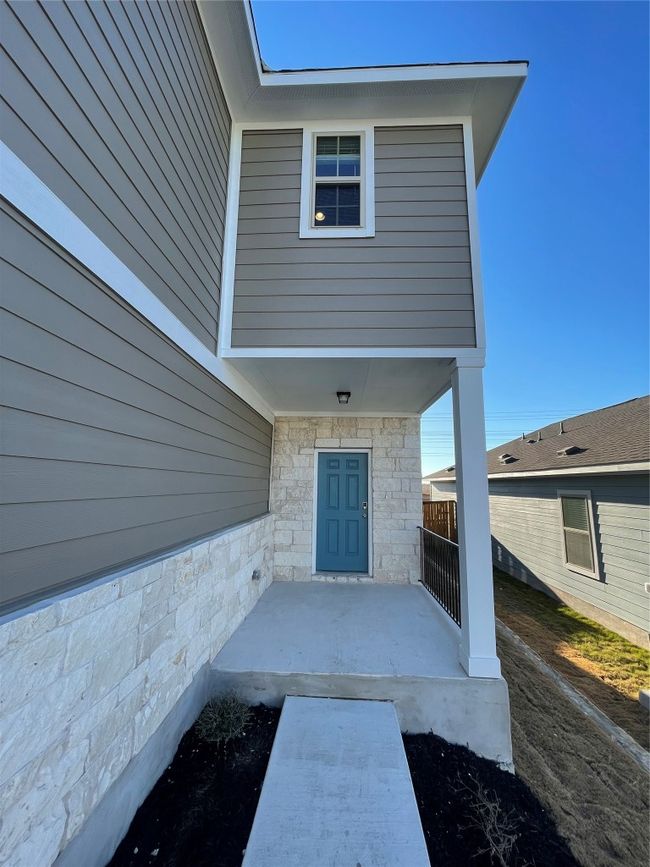 Entrance to property with stone siding | Image 4