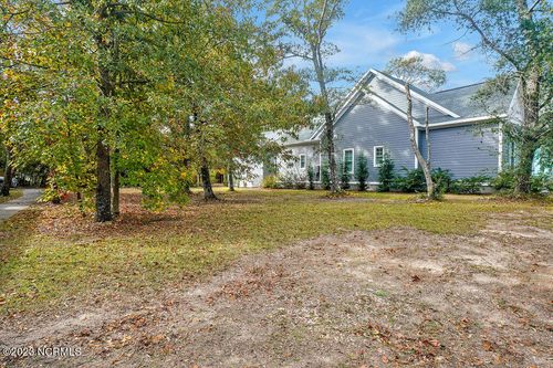 411 Fire Fly Ln, Southport, NC, 28461-2766 | Card Image