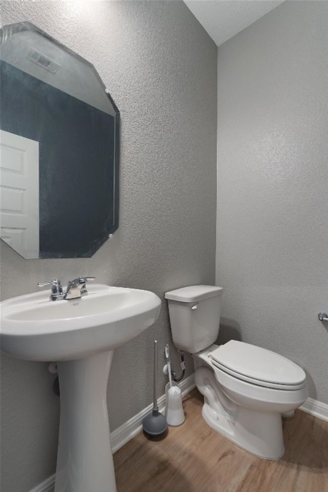 Bathroom with wood finished floors | Image 16