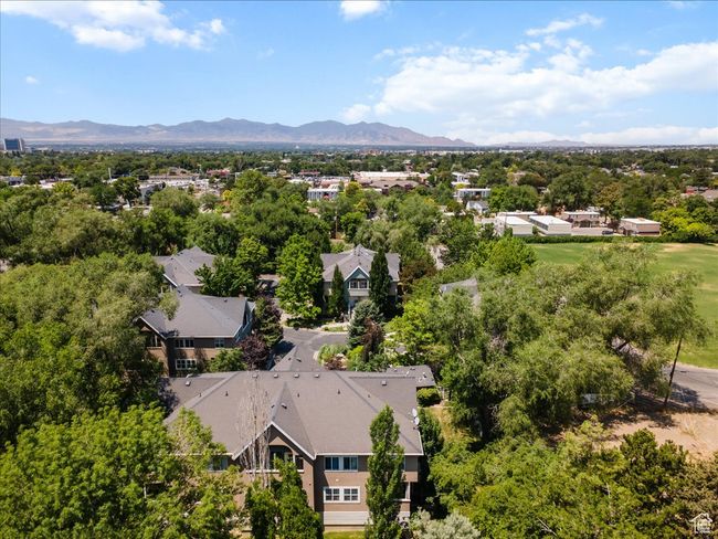 Aerial view of mountains and a tree filled landscape | Image 38