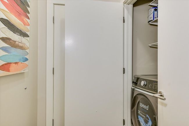 Clothes washing area with laundry area and washer / clothes dryer | Image 12