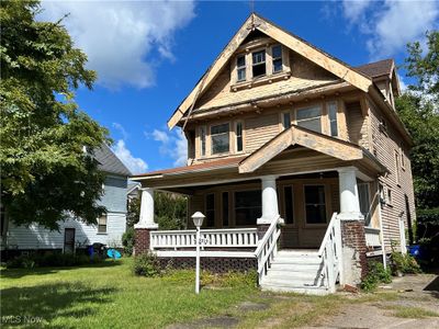 View of front of house featuring a front yard and a porch | Image 1