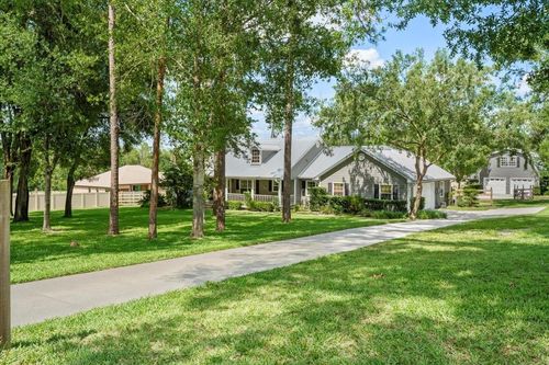 9912 Pine Leaf Ln, Dade City, FL, 33525-1635 | Card Image