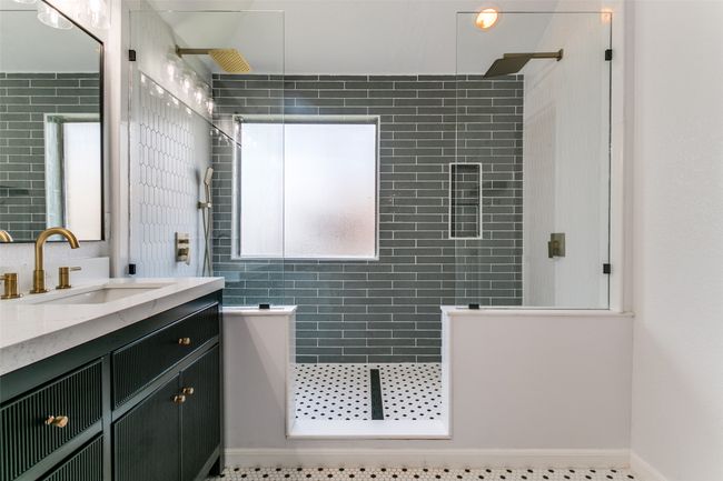 Fully updated in 2024, the primary bathroom features contemporary upgrades, so all you have to do is enjoy it! | Image 21