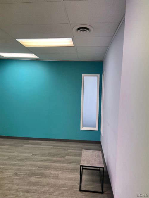 126 S Main St, Adrian, MI, 49221-2661 | Card Image