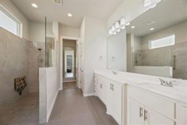 Bathroom with walk in shower, double vanity, and recessed lighting | Image 12