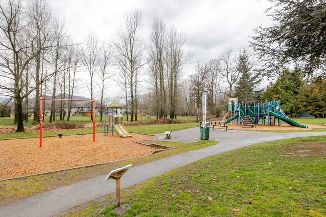 Communal playground featuring a yard | Image 37