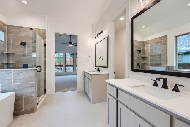 Bathroom with a shower stall, a wealth of natural light, recessed lighting, and a sink | Image 16