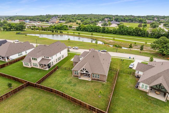 The stocked pond and walking/biking trail are maintained by the HOA. | Image 39