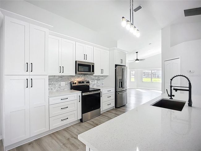 142 Broadmoor Ln, House other with 4 bedrooms, 2 bathrooms and null parking in ROTONDA WEST FL | Image 11