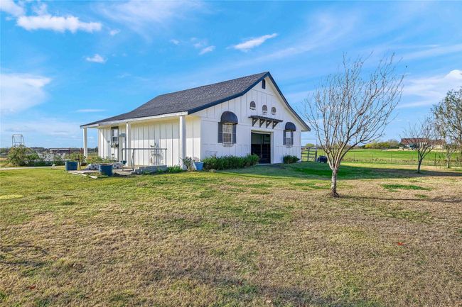 View of home's exterior featuring a lawn | Image 37