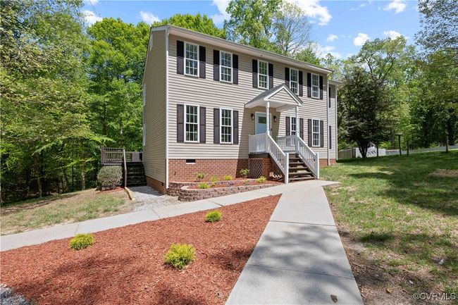 Colonial house featuring crawl space and a front lawn | Image 9