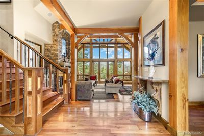 Dramatic wood beams and large windows that frame the stunning vistas | Image 3