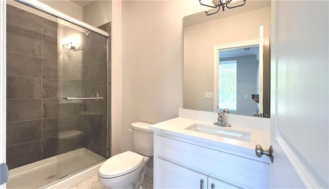 Custom tile in the shower area. | Image 46