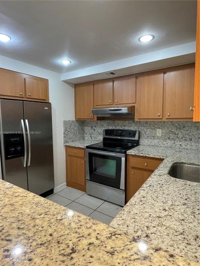 211 - 7011 Environ Blvd, Condo with 2 bedrooms, 2 bathrooms and null parking in Lauderhill FL | Image 2