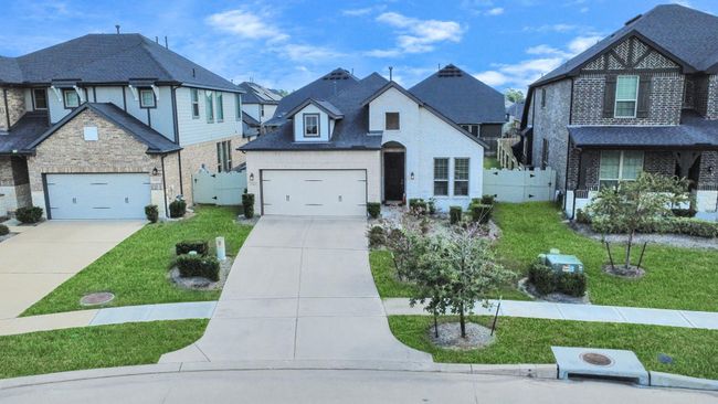 Front yard view showcasing peaceful neighborhood setting | Image 7