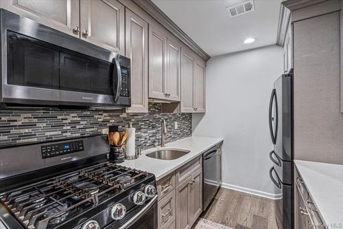 150-150 Pointe Cir N, Coram, NY, 11727-1537 | Card Image