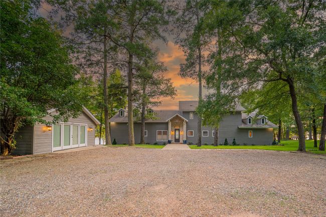 View of front of house with an outdoor structure and french doors | Image 5