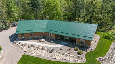 Aerial of meticulous home and manicured yard | Image 3