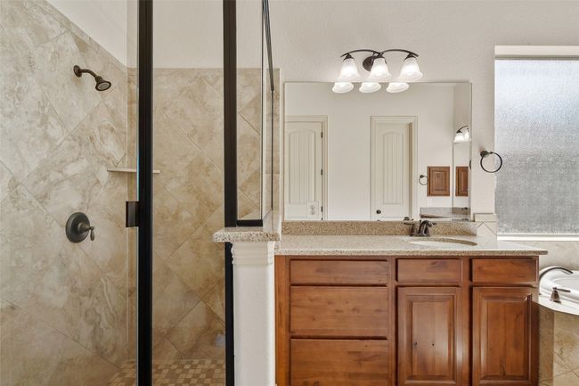 Full bathroom with a stall shower and vanity | Image 31