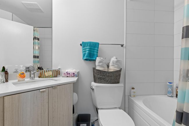 Full bath featuring vanity and shower / tub combo | Image 25