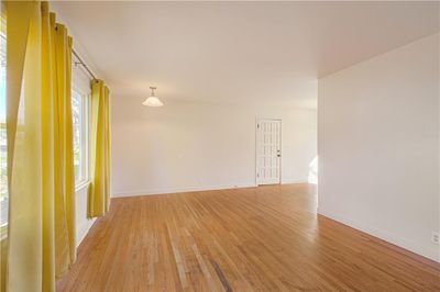 Living Room with refinished Hardwood floors | Image 2