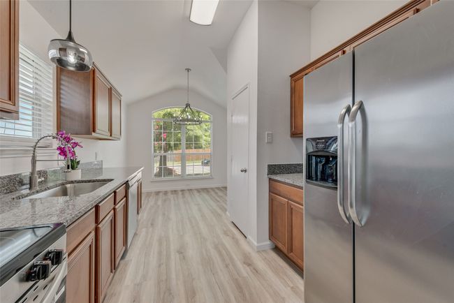 New stainless appliances, granite countertops, new sink and faucet | Image 13