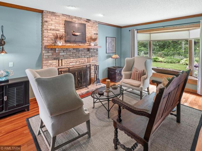 Main floor living room with bay window | Image 19