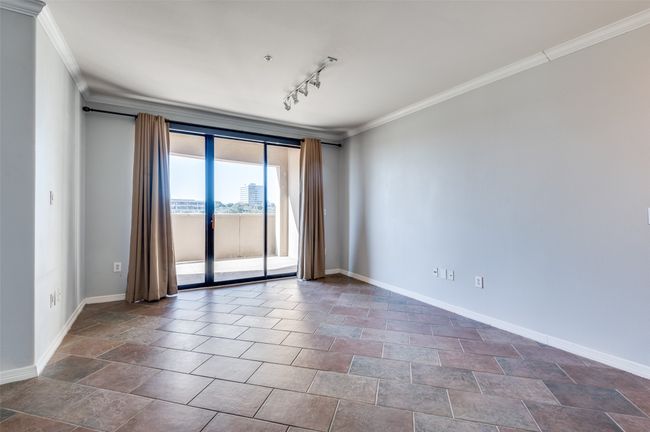 Living room with views of the Ritz Carlton and an abundance of natural light | Image 26