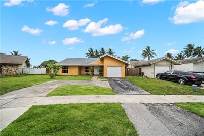 8211 Sw 11th Ct, House other with 3 bedrooms, 2 bathrooms and null parking in North Lauderdale FL | Image 1