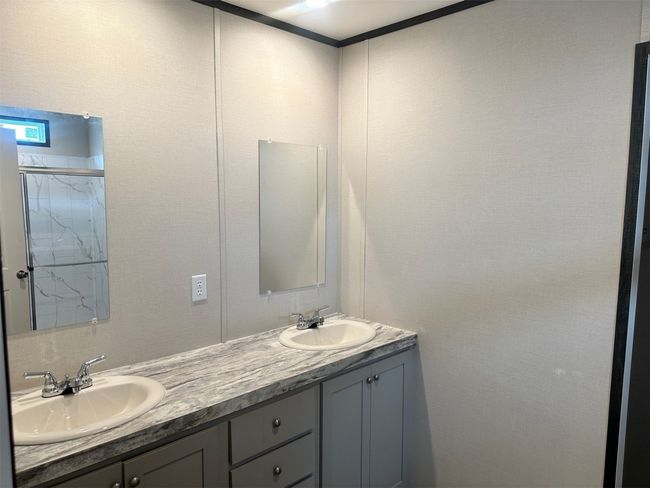 Full bath featuring double vanity and a sink | Image 10