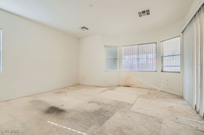 Empty room featuring visible vents | Image 17