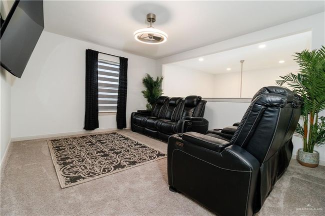 Living room with carpet, baseboards, and recessed lighting | Image 9