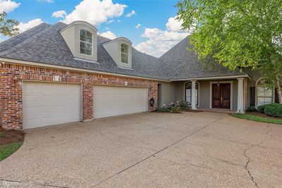 View of front of property featuring a garage | Image 3