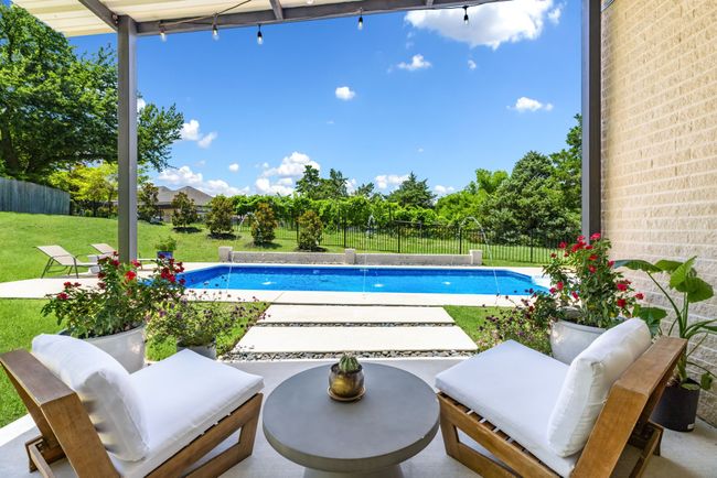 View of pool with a patio and a fenced backyard with plenty of privacy | Image 31