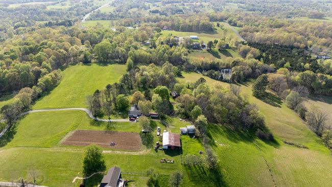 Aerial view of at least three fields included in the sale. No buildings are a part of this sale. NOTE: Aerial Views Show Adjoining Properties Not Included in Sale | Image 6