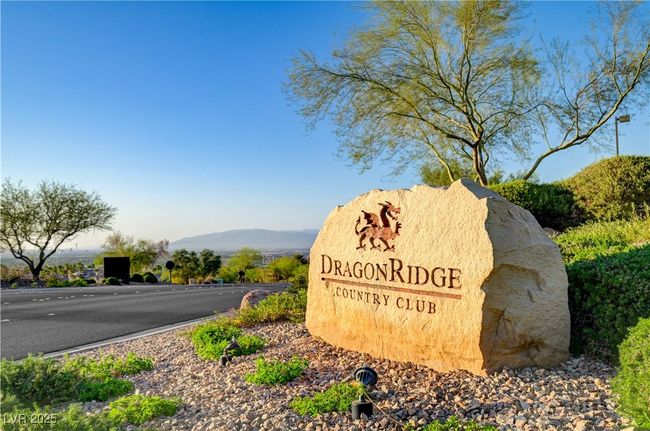 Community / neighborhood sign featuring a mountain view | Image 30