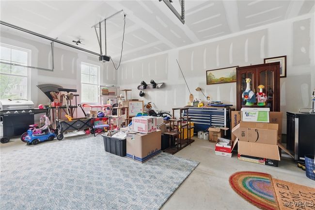 Two-car garage with space for storage, hobbies, or a workshop. | Image 30