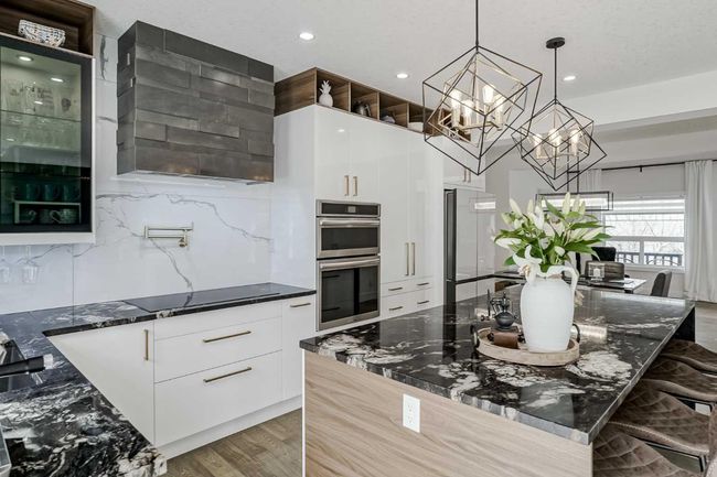 122 Rockywood Cir Nw, House other with 4 bedrooms, 4 bathrooms and 4 parking in Calgary AB | Image 13