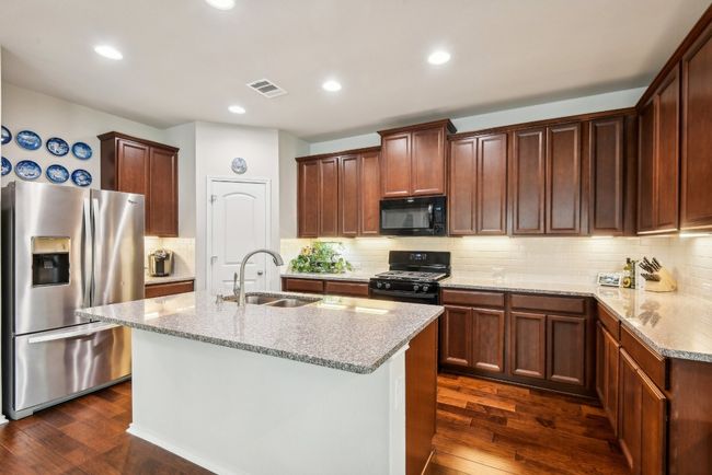 7909 Sunrise Ravine Pass, House other with 4 bedrooms, 3 bathrooms and 4 parking in Lago Vista TX | Image 10