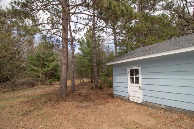Bonus garage space in back - dirt floor for storage or chicken coop. | Image 24