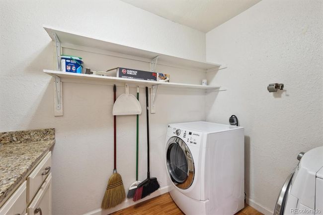 Large main floor laundry room with storage. | Image 11