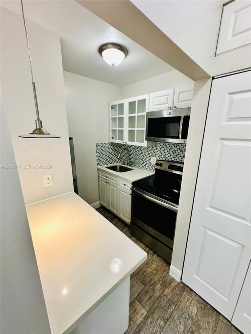 5-119 Menores Ave, Coral Gables, FL, 33134-4052 | Card Image