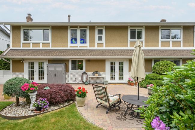 Rear view of property with french doors and stucco siding | Image 30